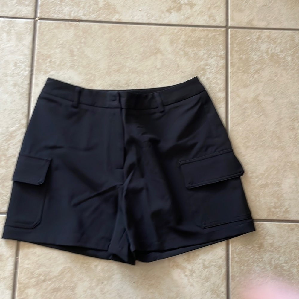 Never worn. 4” inseam